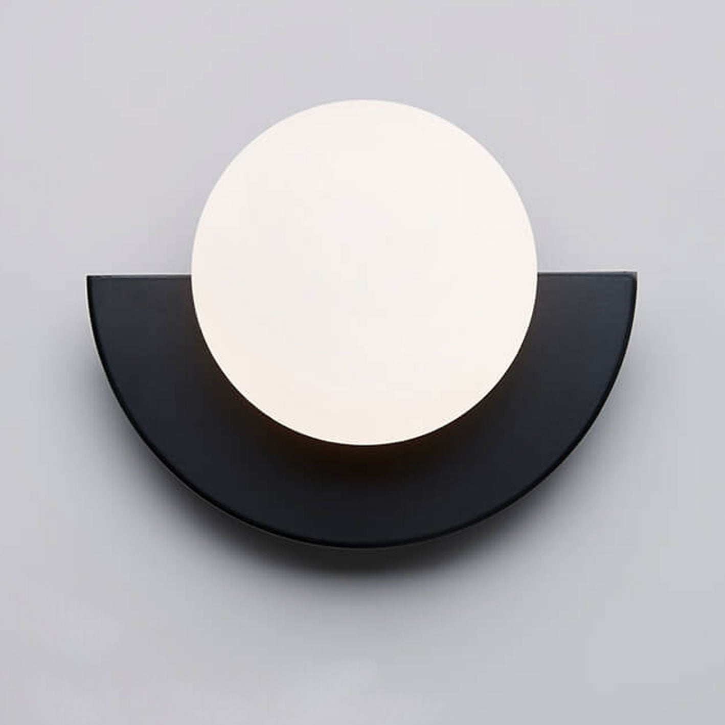 OrbitaLux | Modern Wall Sconce – Vibrant LED Bedroom Light Black Neutral Light Decoluxe.co.uk